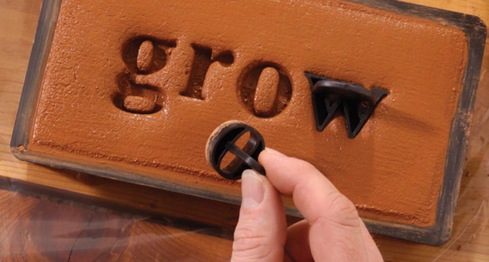 Sello hormigón letras números tipografía minúscula