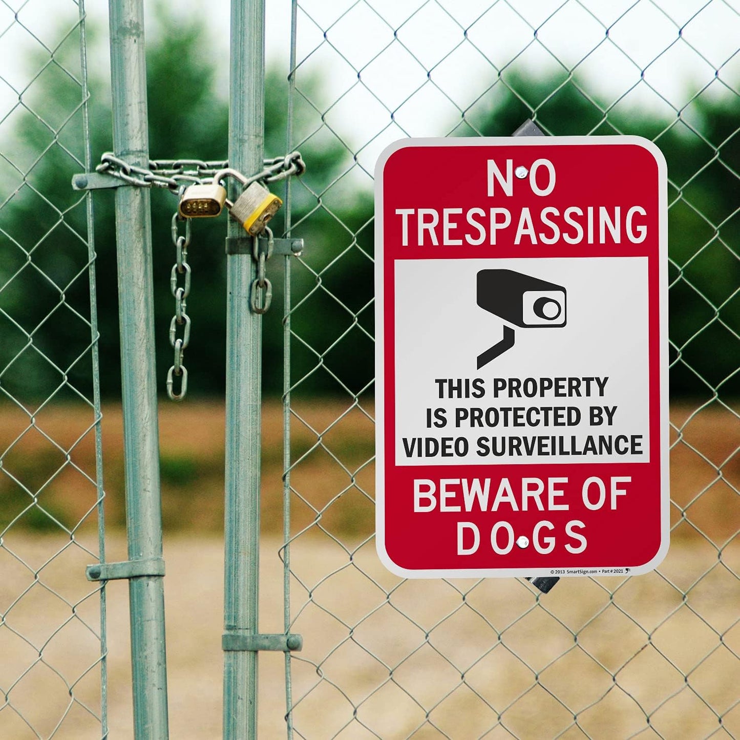 Cartel seguridad No Trespassing con perros negro/rojo