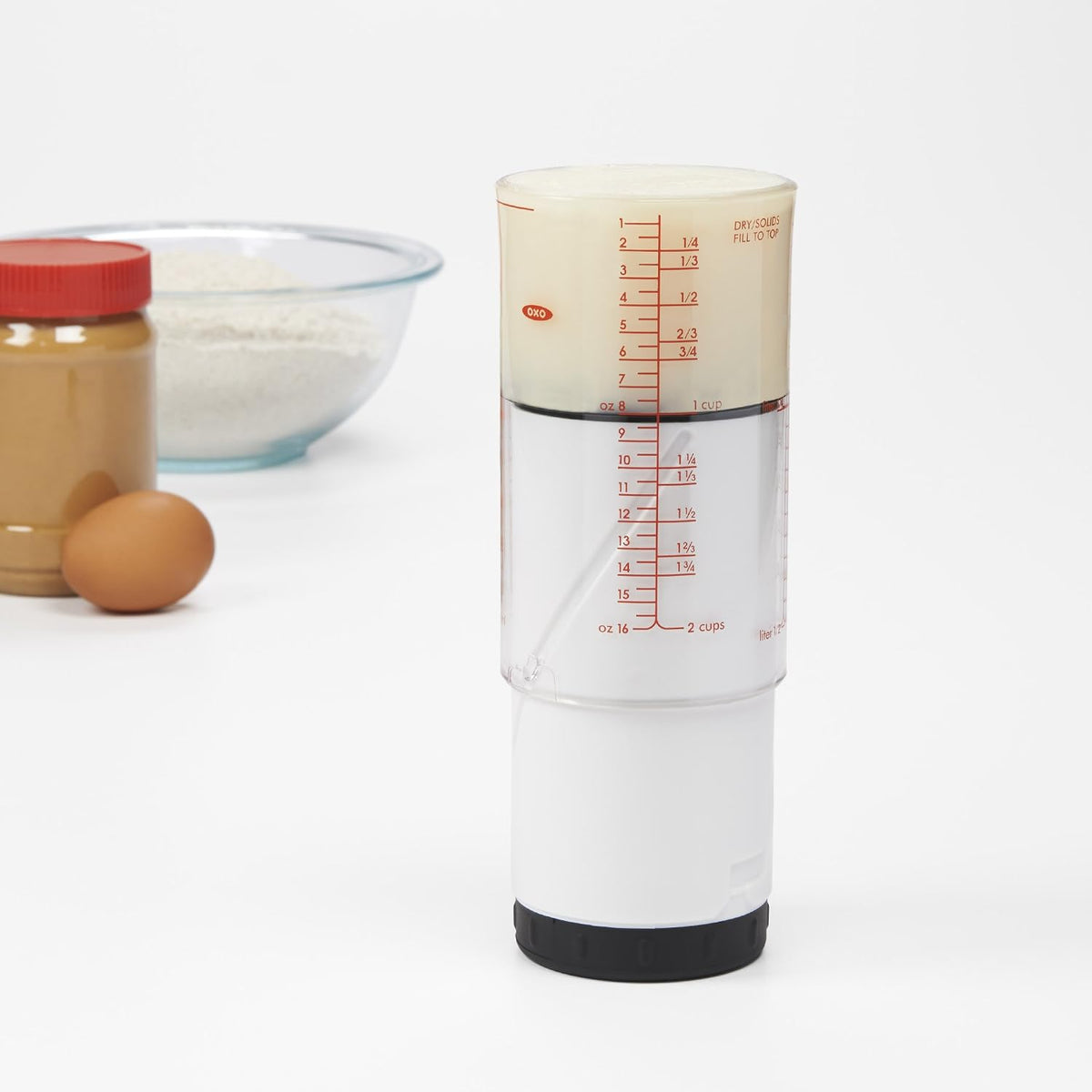Taza medidora ajustable 2 tazas