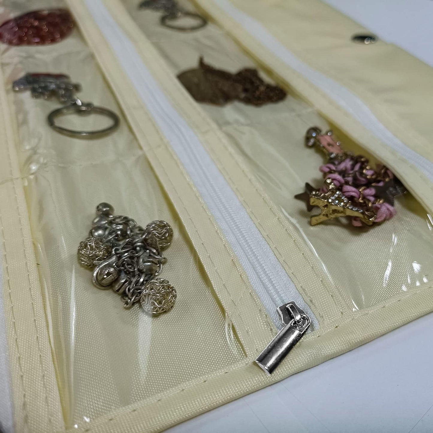 Organiz. joyas colgante 80 bolsillos PVC con cremallera