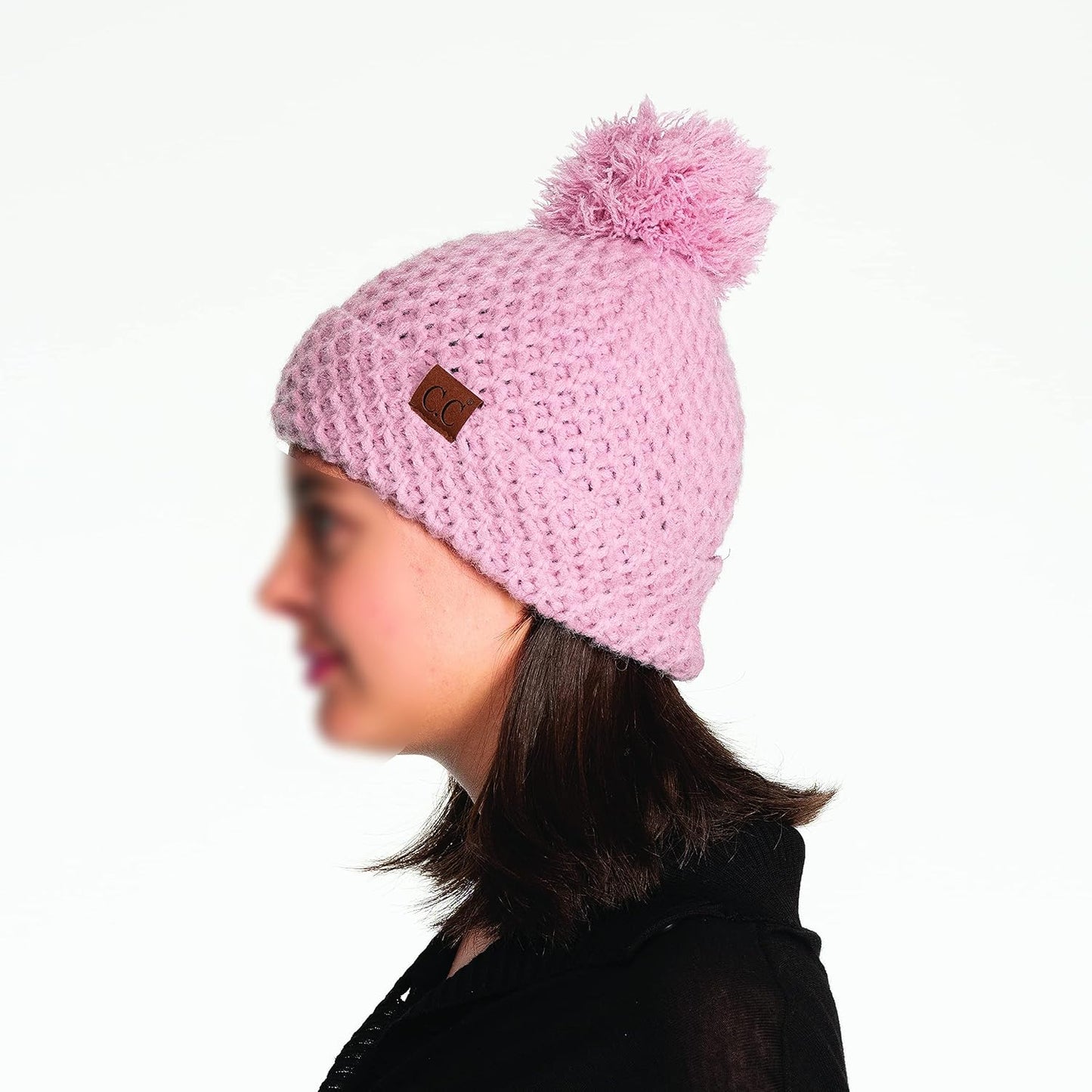 Gorro con pompón mujer diseño semilla invierno