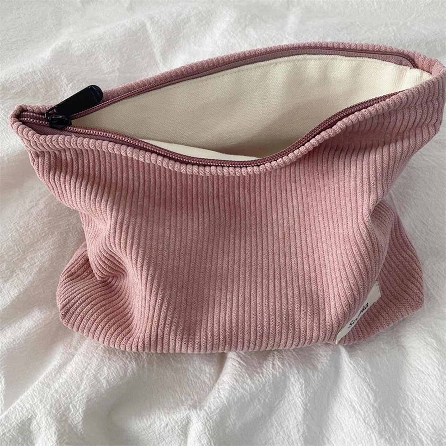 Bolsa ante organizador maquillaje mujer con puntos sonrientes