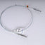 Conjunto cable freno estacionamiento intermedio