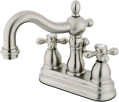 Grifo lavabo central 4pulg mango cruzado níquel