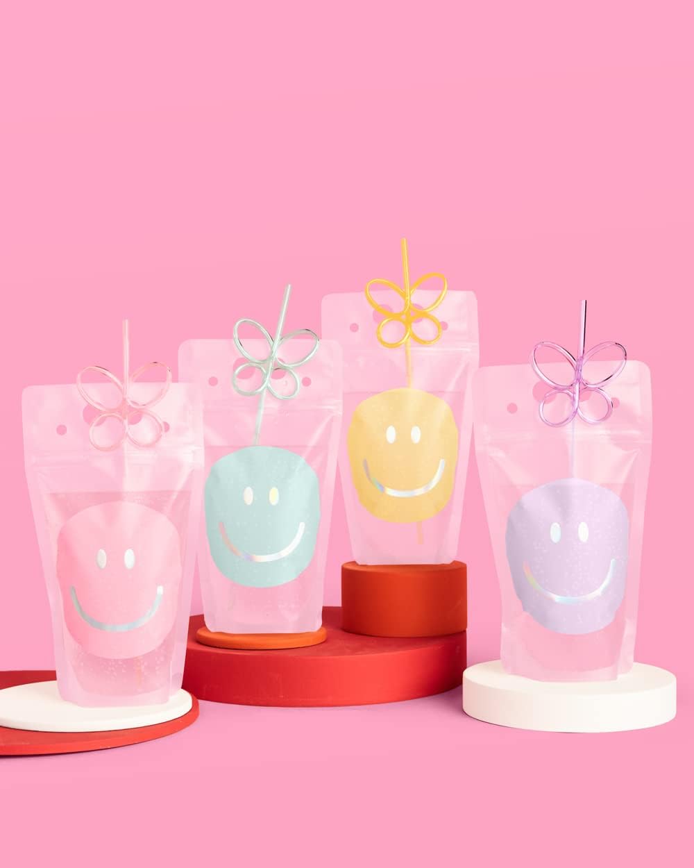 Bolsas bebida sonrientes con pajitas mariposa 16uds
