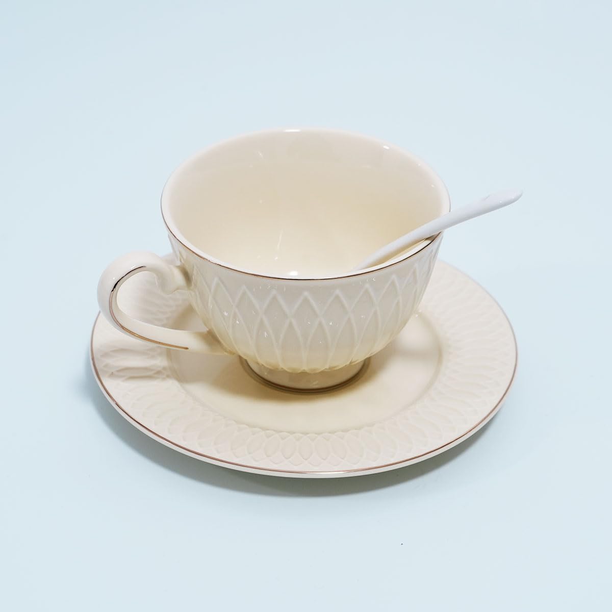 Juego de taza de té y platillo de porcelana de hueso con cuchara elegante floral