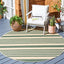 Alfombra lavable Courtyard redonda 4ft beige y verde oscuro