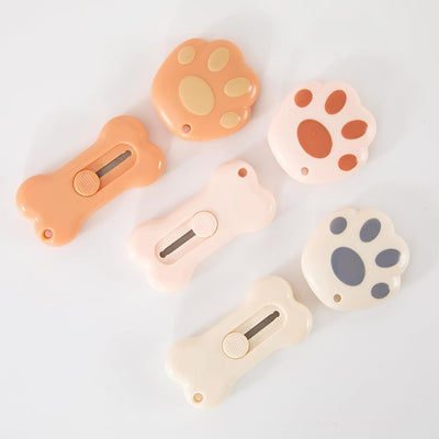 Cortador retráctil para cajas y patas de gato oficina hogar