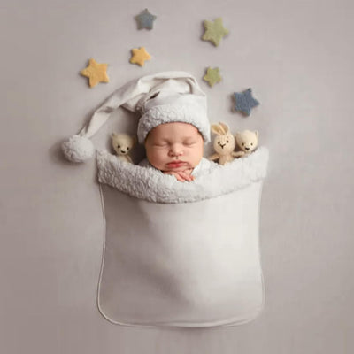 Traje foto recién nacido con sombrero Papá Noel y telón Navidad
