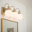 Lámpara hexagonal 3 luces bronce champán baño 22.75pulg