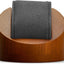 Soporte relojes madera maciza expositor redondo gris