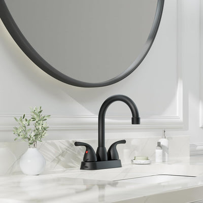 Grifo baño central 4pulg 2 manijas con drenaje metal