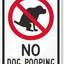 Letrero No Dog Pooping aluminio 12x18"