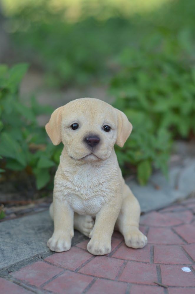 Estatua perro cachorro amarillo