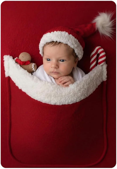 Traje foto recién nacido con sombrero Papá Noel y telón Navidad