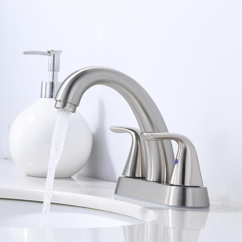 Grifo baño centerset 4" 2 manijas tapón drenaje pop-up