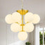 Lámpara techo 10 luces globo candelabro moderno dorado
