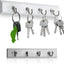 Riel colgador para llaves con 4 ganchos pared blanco