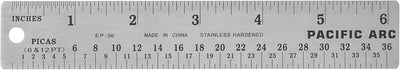 Regla acero inox 15,2cm con picas y respaldo goma