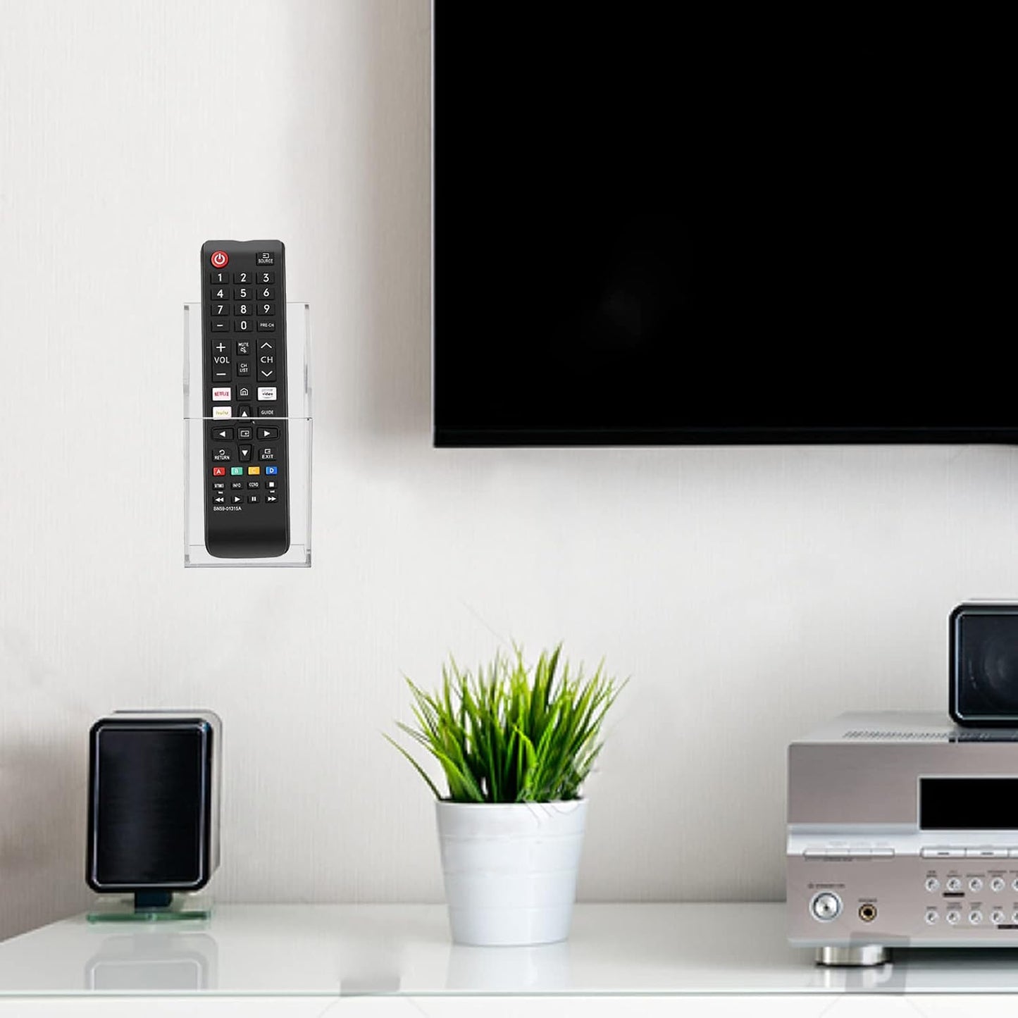 Soporte remoto acrílico transparente para TV y mesita