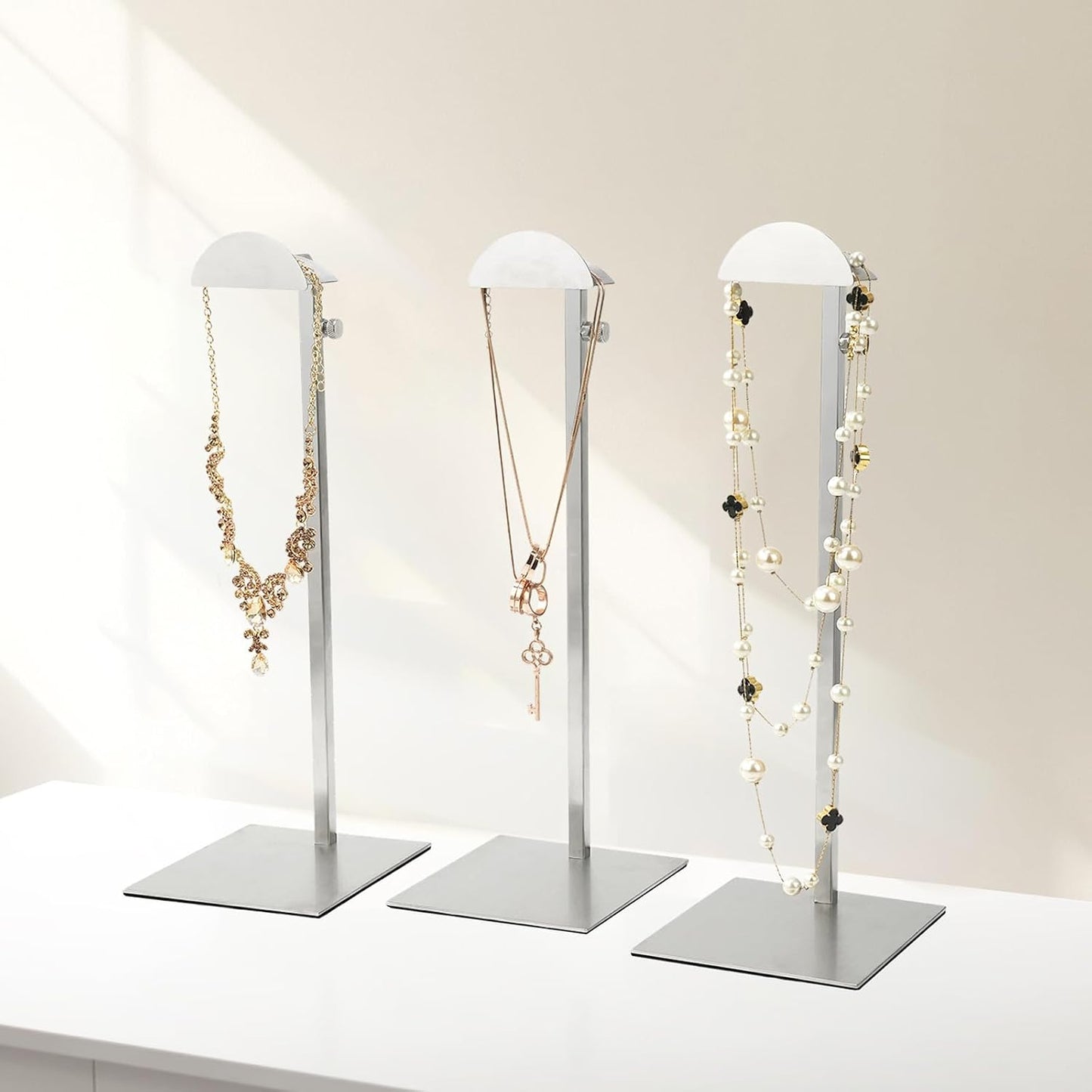 Soporte exhibición bolsos 3 estantes acero inox ajustable
