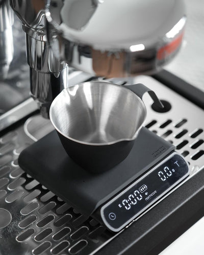 Taza medidora espresso con doble boquilla acero