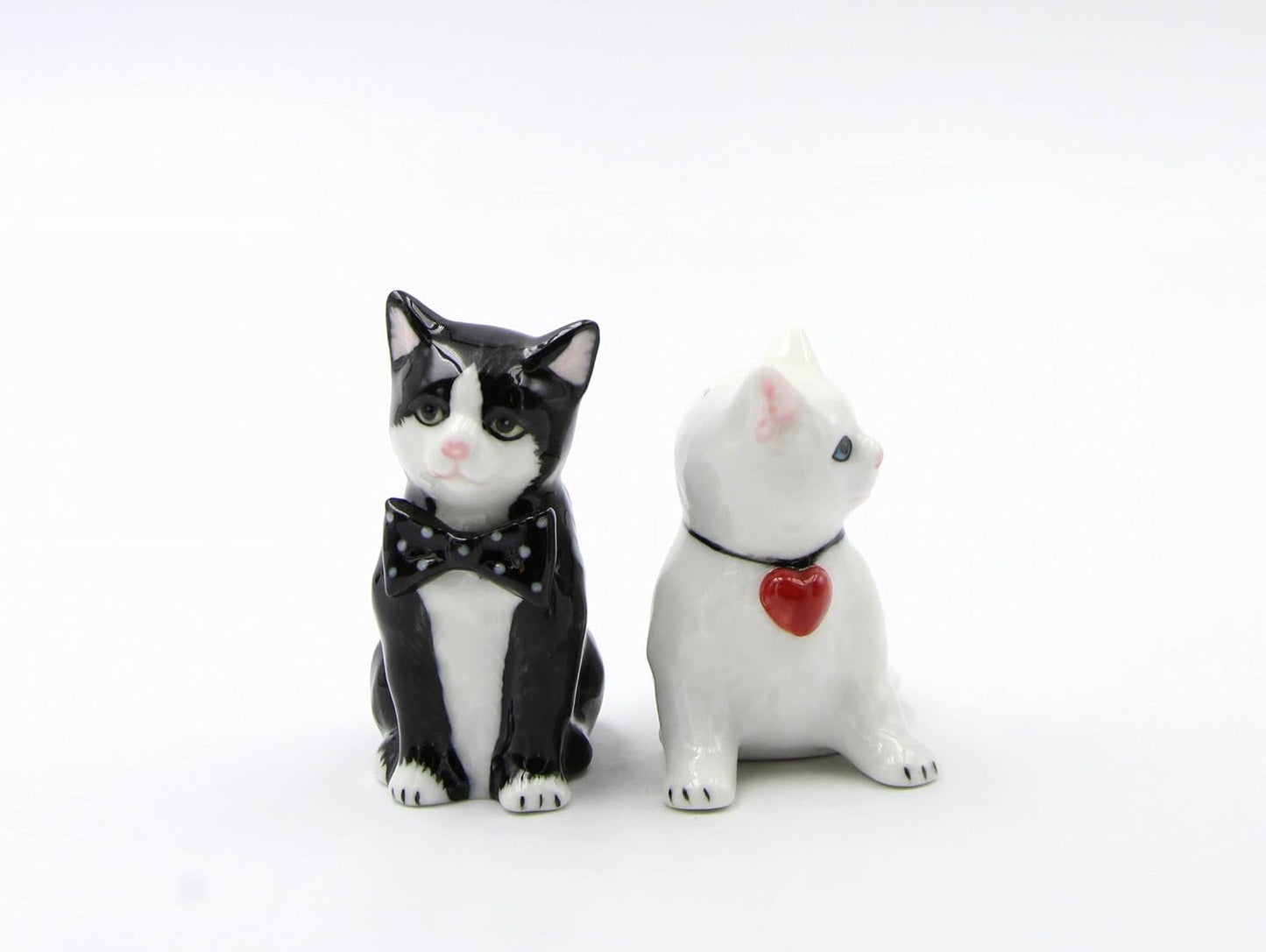 Salero y pimentero con gato blanco y negro