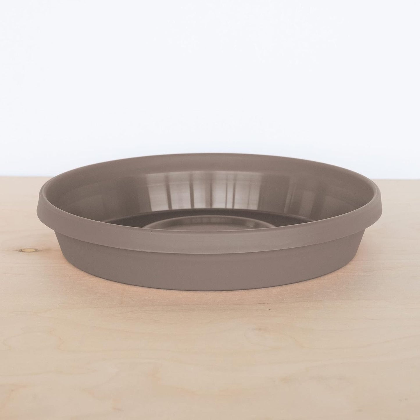 Plato drenaje redondo 14pulg Pebble Stone uso interior y exterior