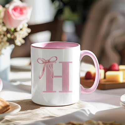 Taza café cerámica rosa con monograma h lazo coqueta