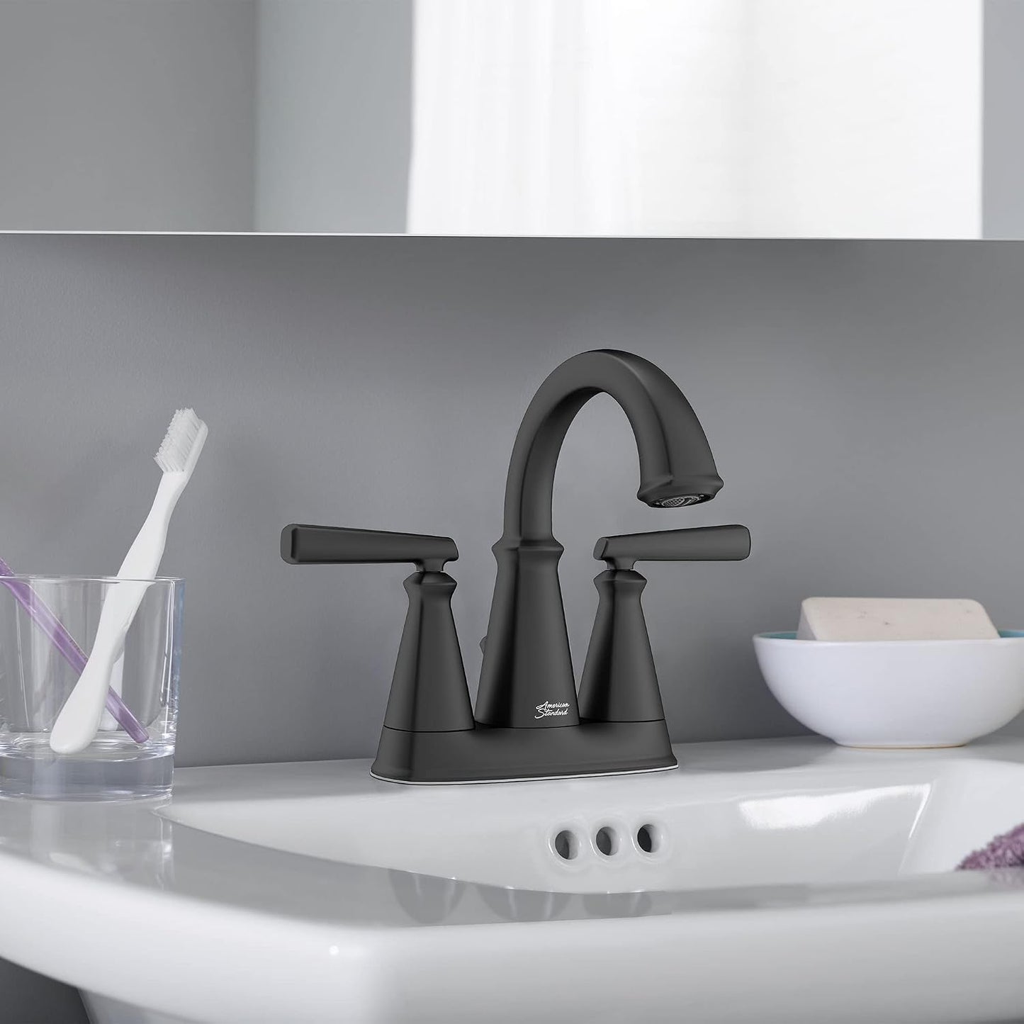 Grifo baño 2 manijas centro 4pulg latón negro mate