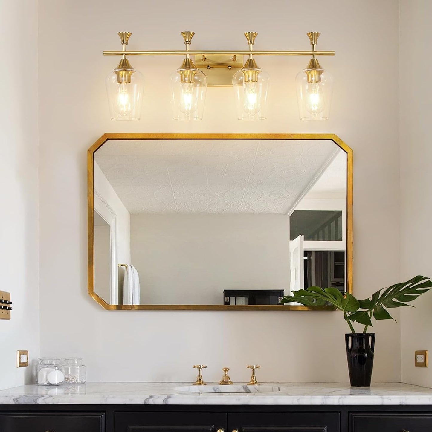 Lámpara baño 4 luces 29" oro cepillado vidrio transparente