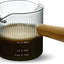 Taza medidora vidrio 4oz con mango madera doble boquilla gris