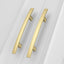 10 Manijas Gabinete Oro Cepillado Curvadas 3-3/4pulg