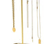 Estante joyas forma T metal dorado base cerámica