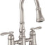 Grifo cocina acero inox puente abatible dos manijas