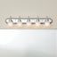 Lámpara baño 36pulg vidrio grabado 5 luces bronce