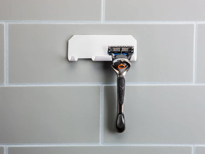 Soporte doble para maquinilla afeitar pared