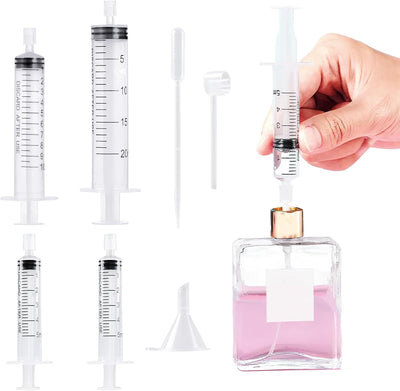 Kit transferencia perfume con embudo y bomba jeringa 7 pzas