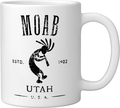 Taza cerámica Kokopelli Moab Utah diseño desgastado blanca