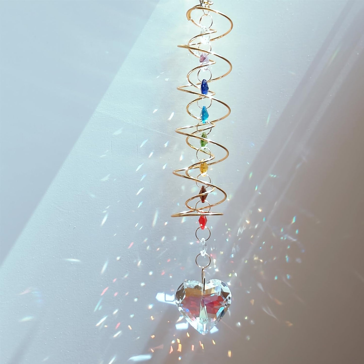 Atrapasoles cristal con corazón y doble espiral para ventana