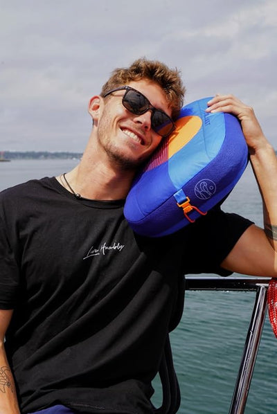 Almohada inflable con bolsa arena para playa