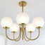 Candelabro vintage 5 luces forma globo vidrio leche