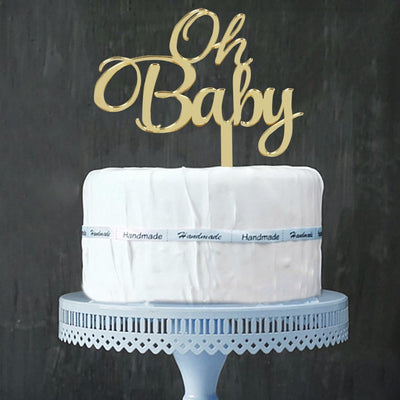Decoración pastel dorado con espejo baby shower