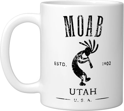Taza cerámica Kokopelli Moab Utah diseño desgastado blanca