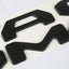 Letras inserción portón trasero comp Tacoma 24-25 negro