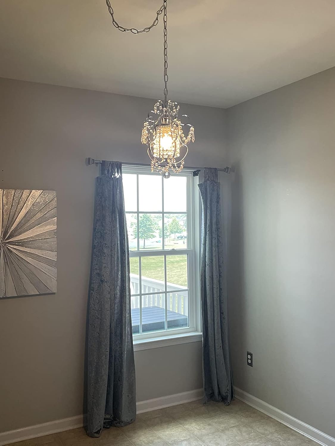 Candelabro enchufable de hierro y cristal para dormitorio