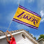 Bandera Lakers exteriores con ojales grandes