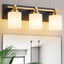 Accesorios iluminación baño 3 luces doradas y negras E26