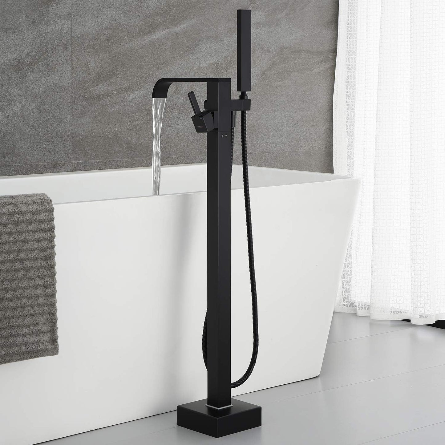 Grifo bañera independiente negro montaje piso manija única