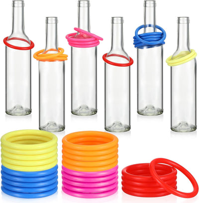 Set lanzamiento anillos 31 pzas 25 anillos 6 botellas vidrio